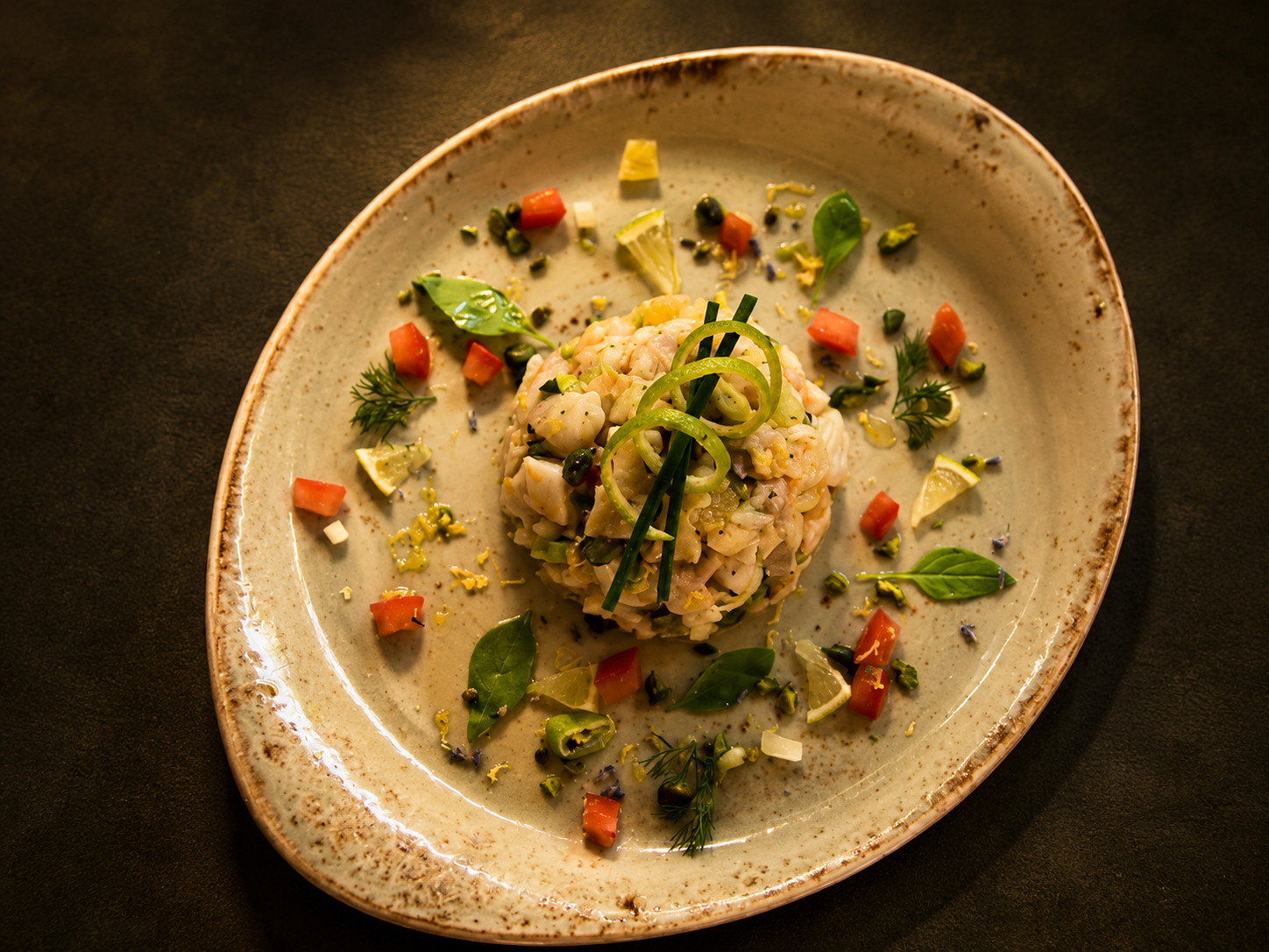 Tartare de poisson aux agrumes et herbes fraîches